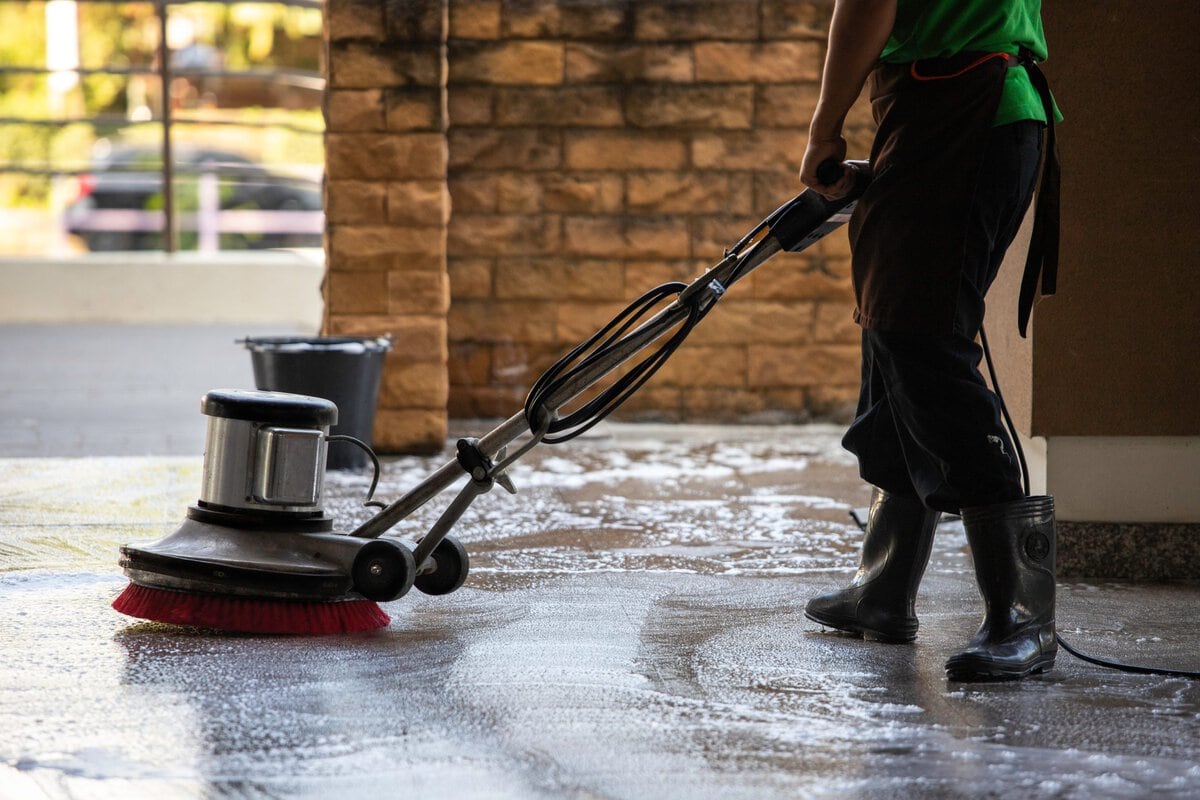 A Man Worker Cleaning The Floor With Polishing Machine Adobestock 300248239 Scaled - Bionetix®